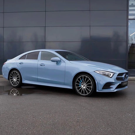 Side profile of a Mercedes wrapped in TeckWrap China Blue (CG22-HD) Gloss Vinyl, showcasing the sleek aesthetic and luxurious finish.