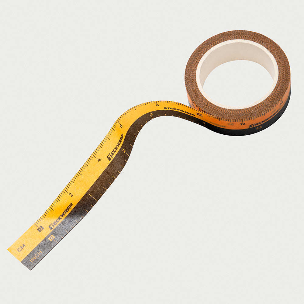 Flexible TeckWrap pre-marked masking tape showing clear measurement scale