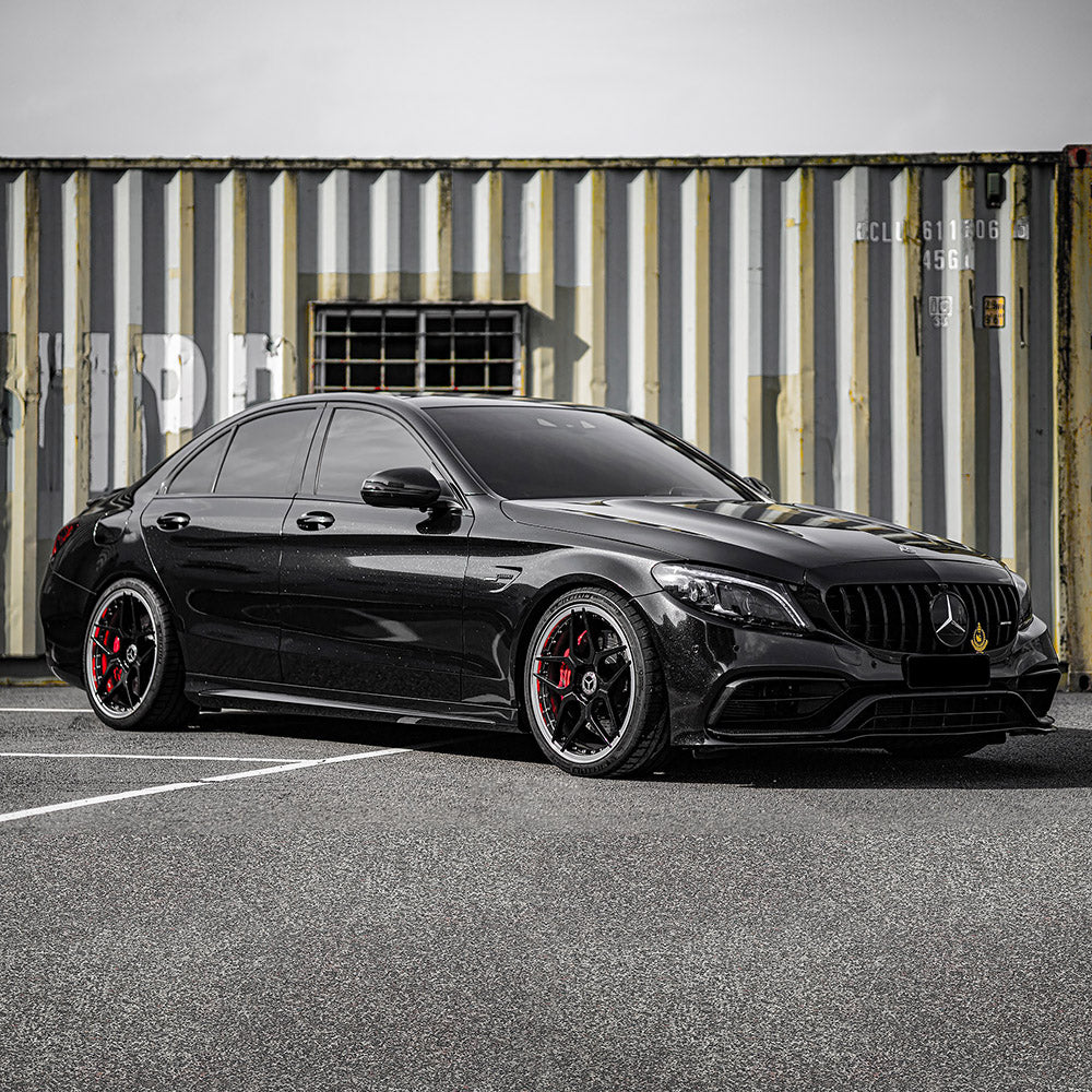 Front side view of Mercedes-Benz wrapped in TeckWrap Ebony Sparkle CK202-HD gloss vinyl wrap with deep black glitter finish