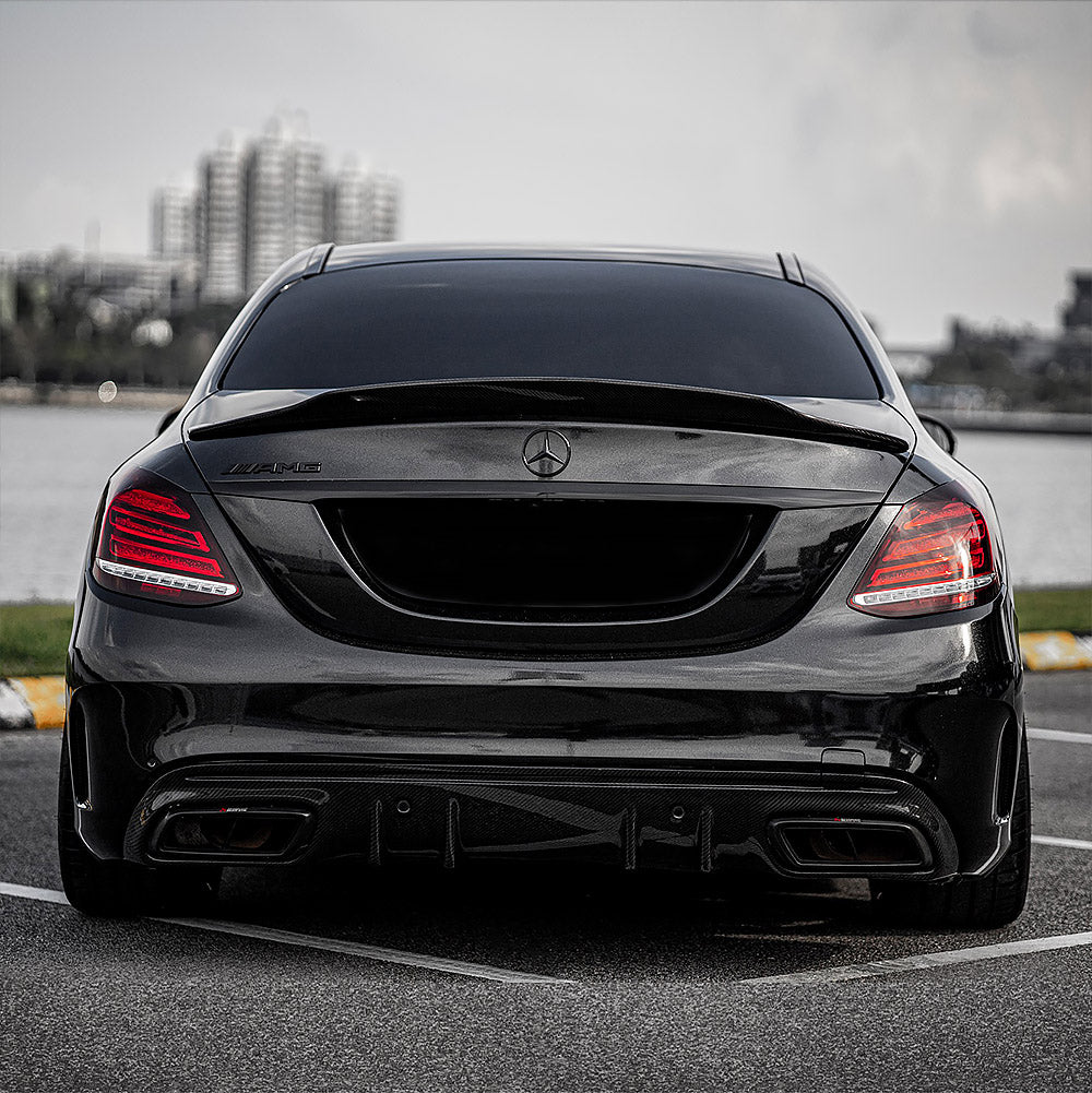Back view of a car fully wrapped in TeckWrap Ebony Sparkle CK202-HD vinyl showing smooth glossy surface with glitter accents