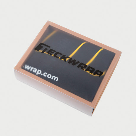 TeckWrap branded canvas tote bag neatly folded and displayed inside a sleek, transparent retail packaging box, ideal for gift or promotional use
