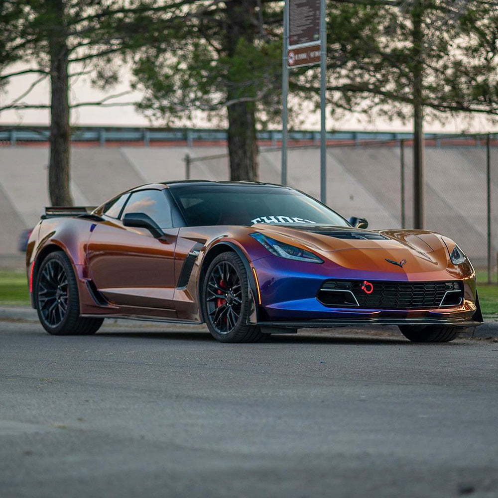 Chevrolet Corvette C7 showcasing TeckWrap Purple Sunset chameleon wrap with eye-catching copper, violet, and blue shades.