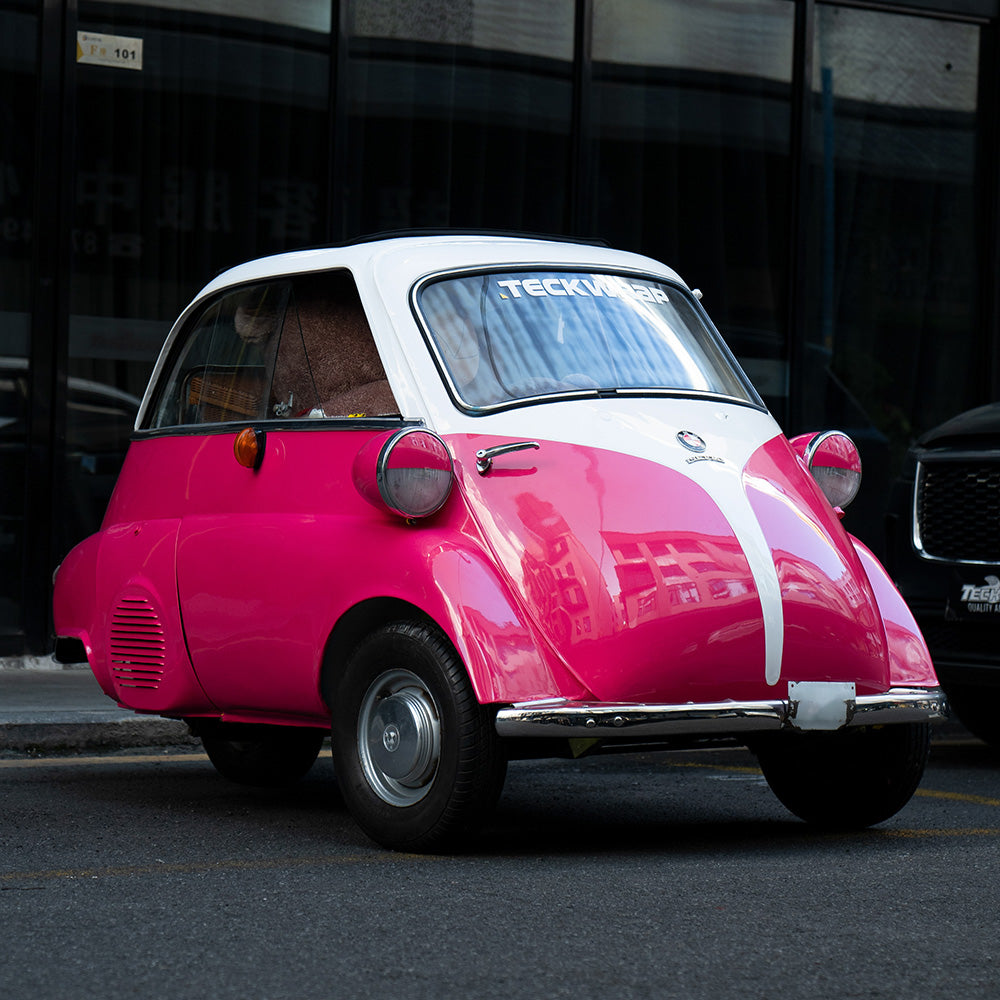 Classic BMW Isetta wrapped in TeckWrap Sorbet Pink CG59-HD Vinyl – eye-catching gloss pink vehicle wrap with retro appeal