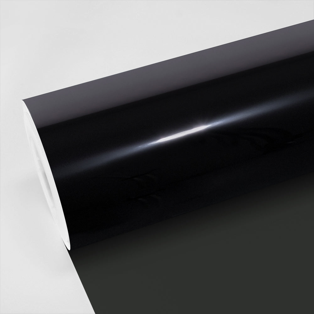 Close-up view of TeckWrap Zenith05 Window Film, showcasing its glossy, deep-black finish on a roll, ideal for superior window tinting and enhanced privacy.