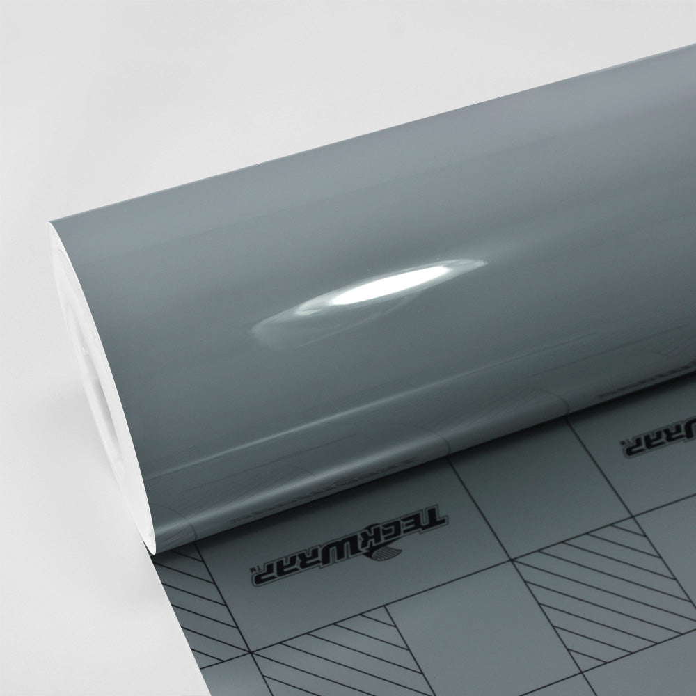 Roll of TeckWrap Gloss Amazon Grey (CG03-HD) vinyl wrap showcasing a smooth, high-gloss surface ideal for vehicle customization.