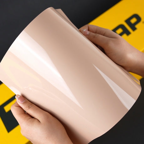 Close-up of Sahara Beige (CG46-HD) TeckWrap Vinyl Wrap gloss, demonstrating its reflective shine and smooth texture.