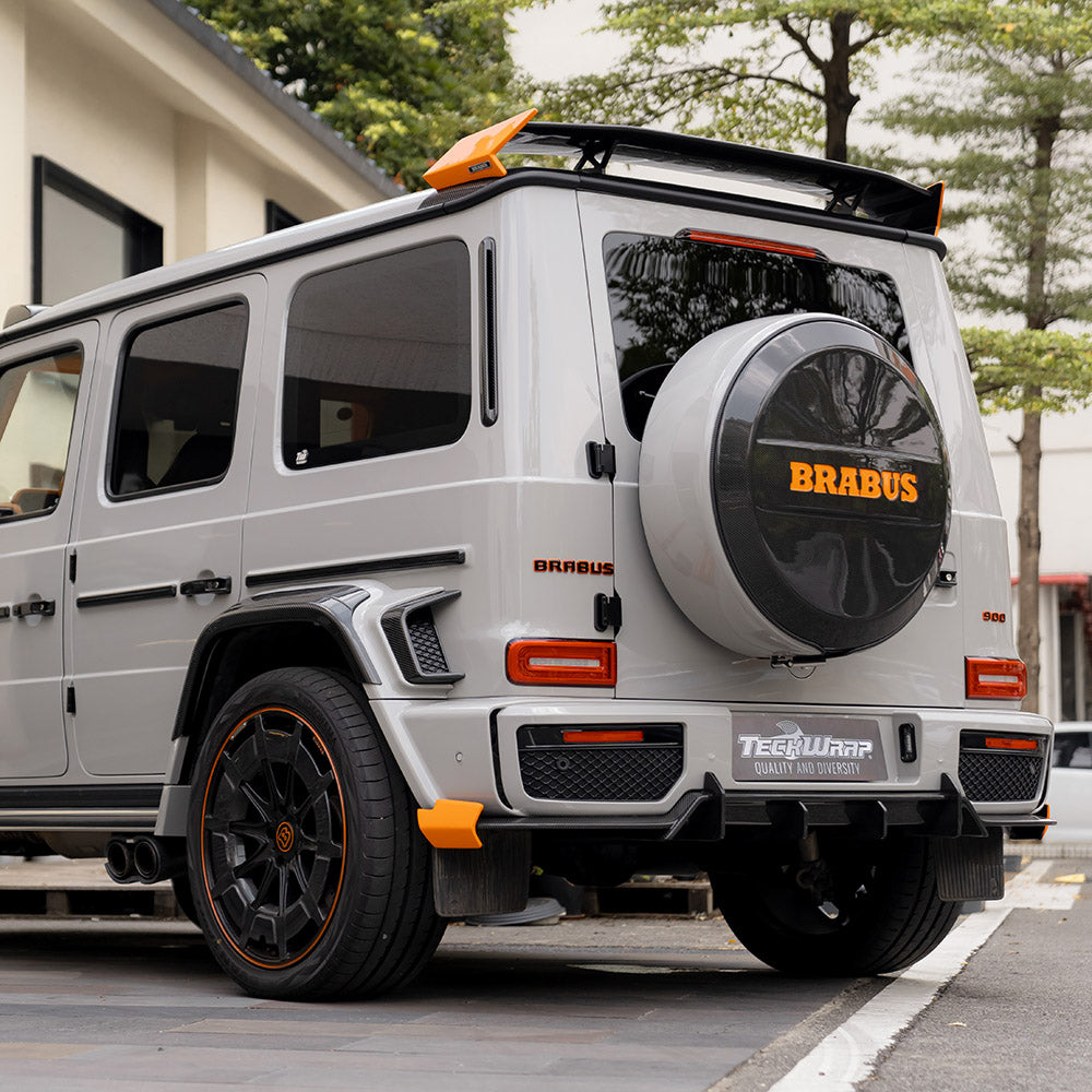 Rear-side angle of a Brabus G-Class High Gloss Vintage Grey Vinyl Wrap
