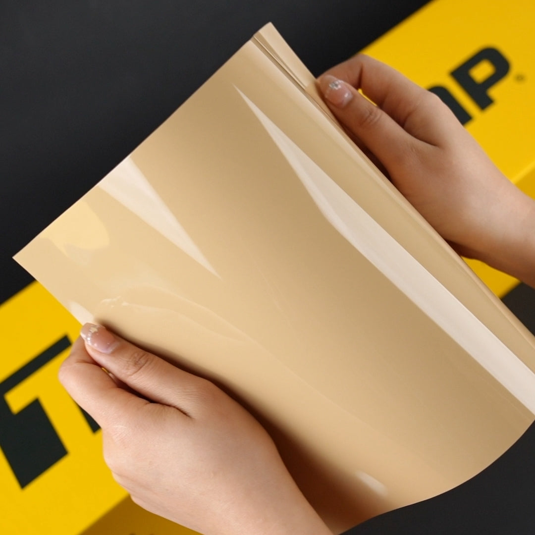 Close-up of TeckWrap CG52-HD Leather Beige Gloss Vinyl Wrap sheet – premium glossy beige vinyl with smooth surface and flexibility.