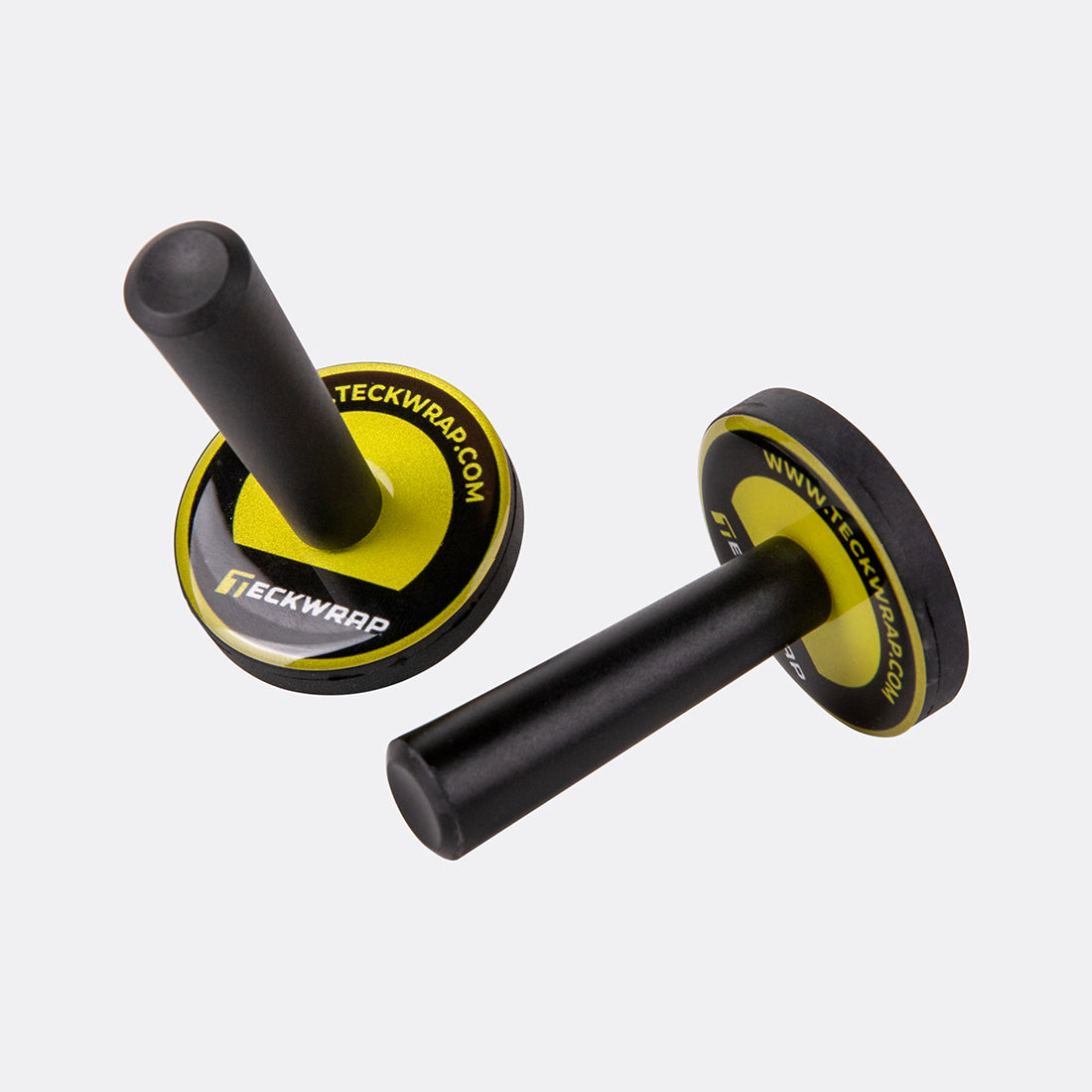 Close-up image of TeckWrap vinyl wrap magnets positioned diagonally to display both handle and base detailing.