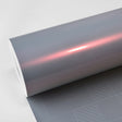 Glossy roll of Silver Sunset vinyl wrap displaying a soft, pearlescent pink-to-silver color shift, ideal for distinctive vehicle customizations.