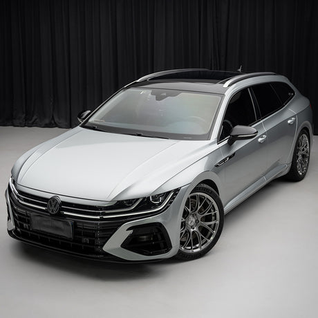 Volkswagen Arteon finished in TeckWrap Gloss Arctic Silver (RB27-HD) Vinyl Wrap, highlighting a sleek and futuristic appearance with its brilliant high-gloss silver exterior and chrome-like reflectivity.