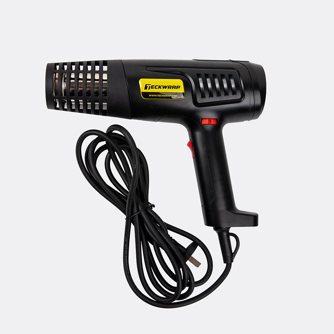 TeckWrap Standard Heat Gun with power cord neatly coiled, showcasing compact and ergonomic design for vinyl wrap applications.