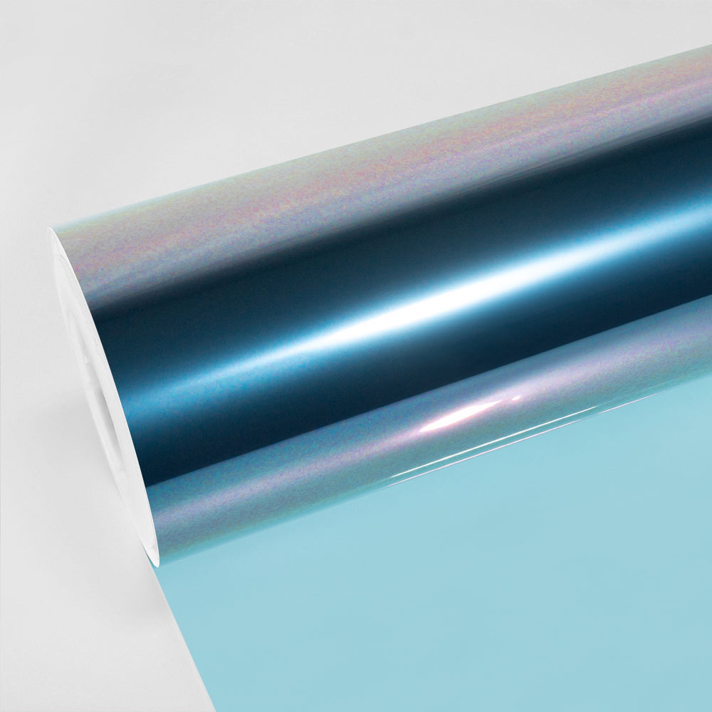 TeckWrap Sunset Pink TWF-K03 window film roll with a soft iridescent sheen shifting from deep blue to pastel pink, designed for high-performance automotive and architectural glass tinting.