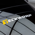 Close-up of TeckWrap vinyl logo sticker fully applied to back window of a vehicle