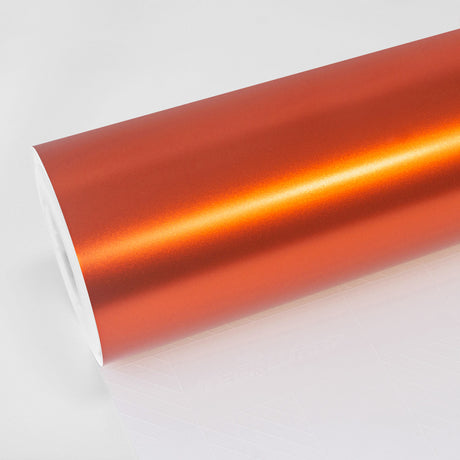 TeckWrap Autumn Orange (VCH418-S) satin vinyl wrap roll with a metallic finish, displayed on white backing paper for automotive customization.