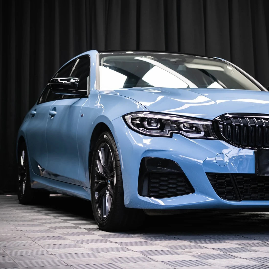 BMW headlights in High Gloss China Blue Vinyl Wrap