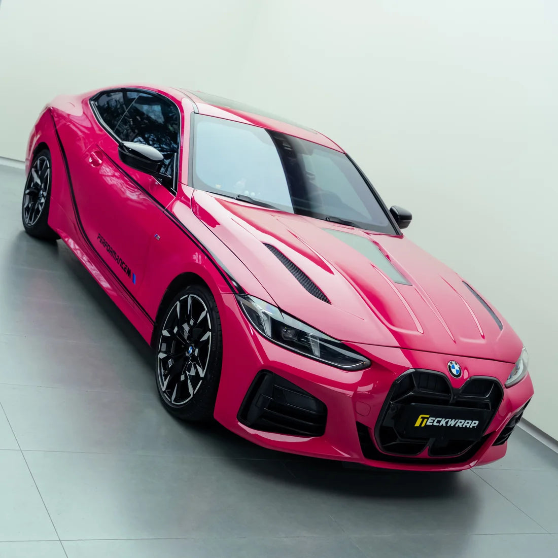 BMW showcasing a High Gloss Berry Red Vinyl Wrap