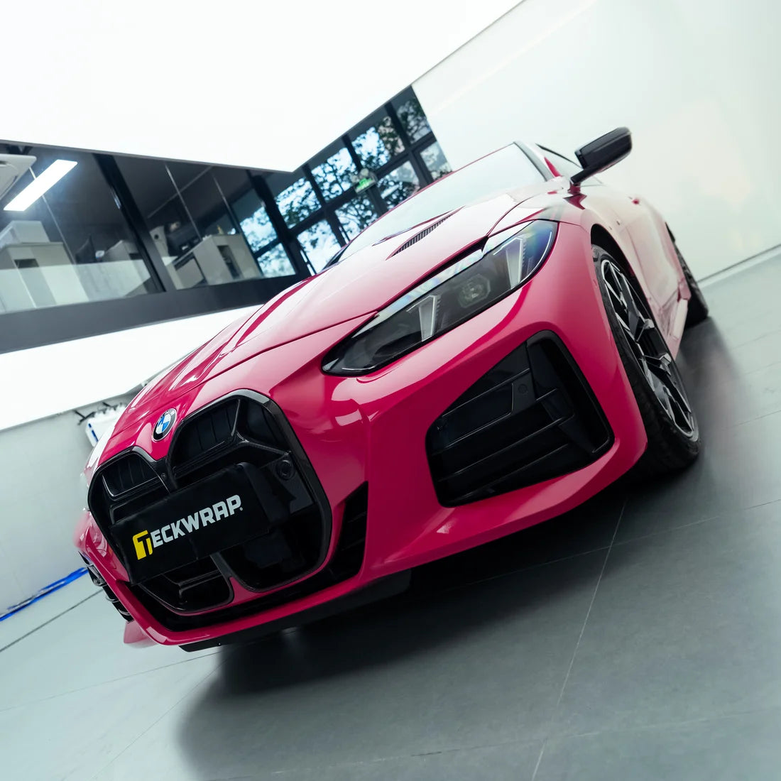 BMW showcasing a High Gloss Berry Red Vinyl Wrap