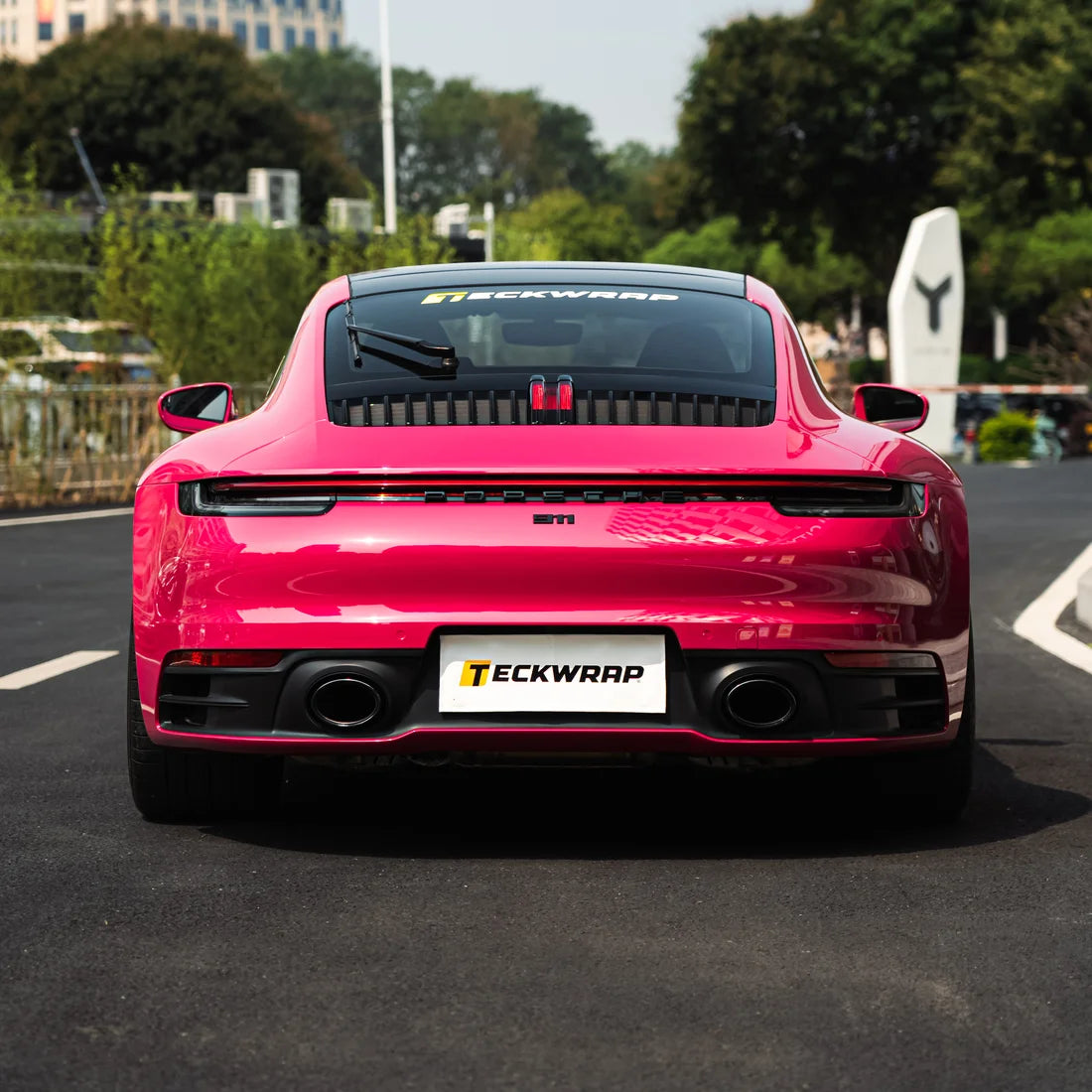 Porsche showcasing High Gloss Berry Red Vinyl Wrap