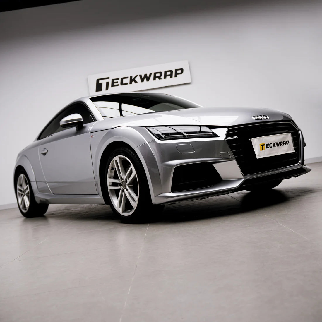 Front view of a Audi wrapped in Gloss Metallic Stellar Silver PPF