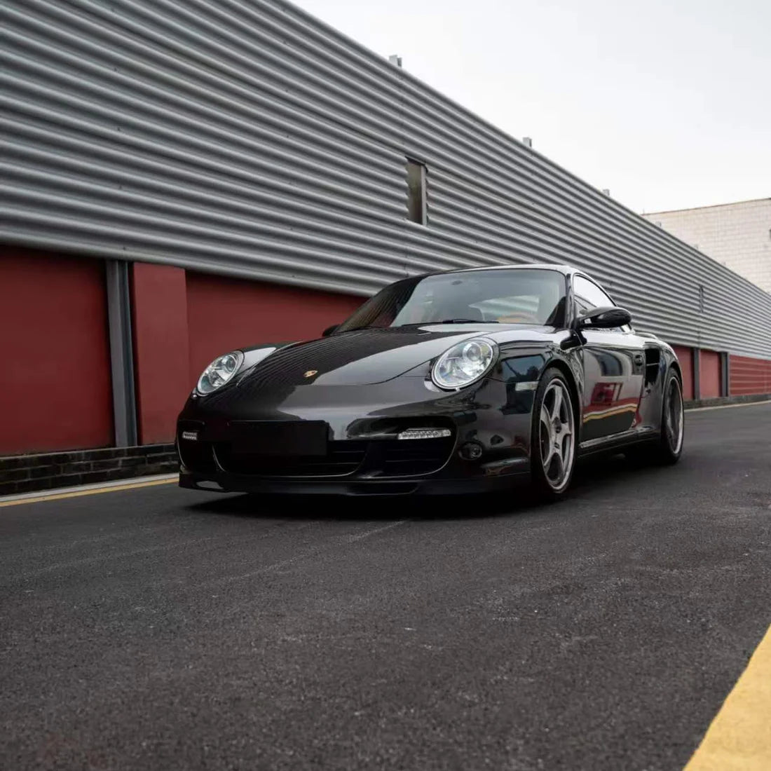 Porsche wrapped in Stone Bronze Gloss Metallic PPF