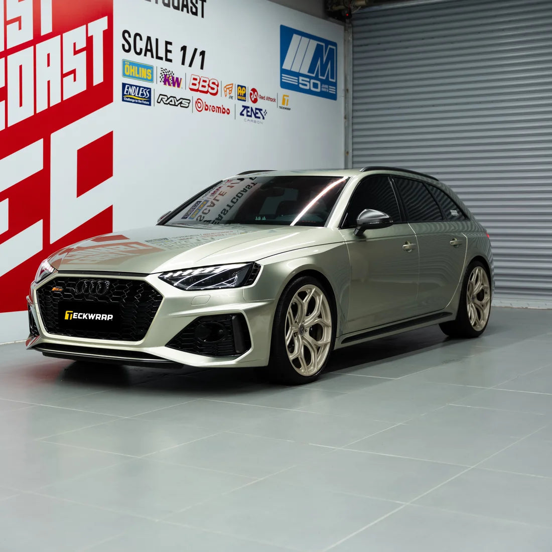 Front view of a Audi in Stealth Olive Gloss Metallic Color PPF