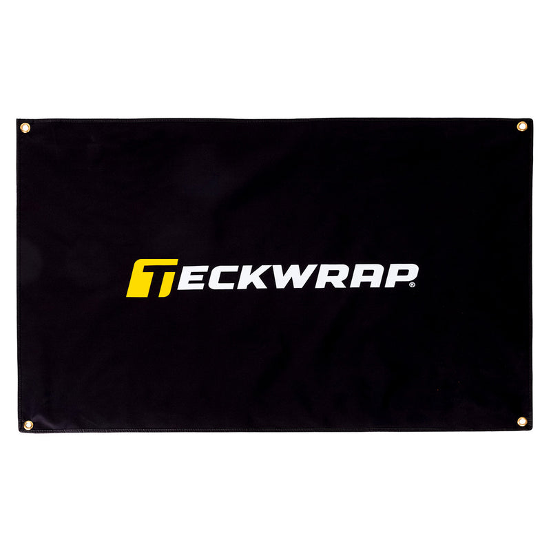 TeckWrap branded black promotional banner with four gold grommets for easy hanging display at events or workshops