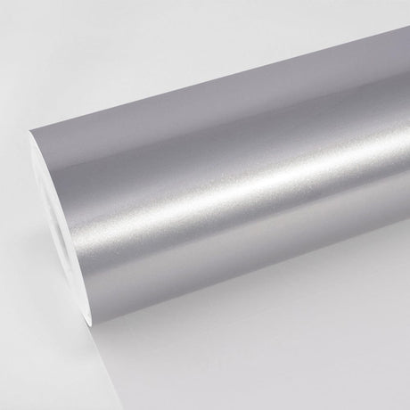 A detailed close-up of the TeckWrap Dolomite Silver (RB33-HD) Gloss Vinyl Wrap roll, showcasing its shimmering metallic silver finish with a subtle glossy sheen, perfect for high-end vehicle customization.