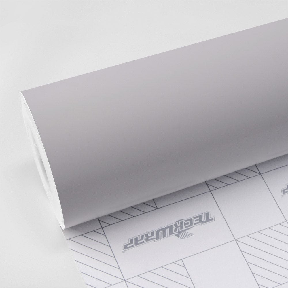 TeckWrap Granite Grey SCM47 satin chrome vinyl wrap roll with backing paper showing TeckWrap branding and grid pattern for precision cutting