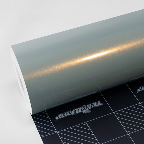 Glossy TeckWrap Palladian Blue vinyl wrap roll on white background