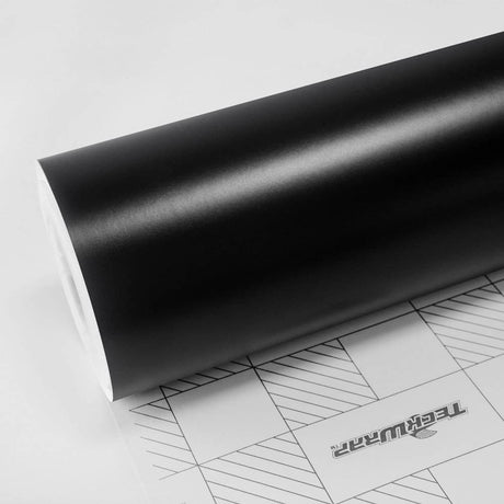 Roll of TeckWrap Black Matte Vinyl Wrap (CM01M) showcasing smooth, rich matte finish ideal for sleek car customization.