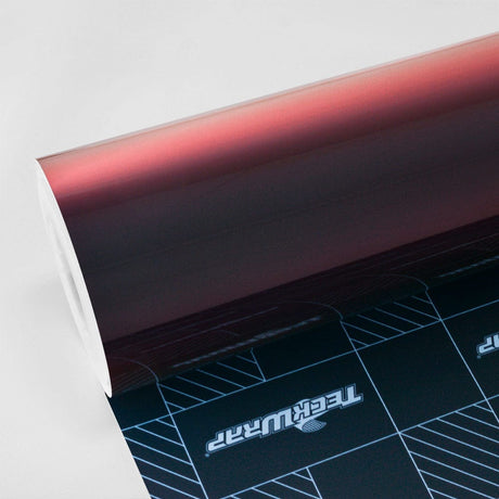 Roll of TeckWrap Madeira Red (RD17-HD) Chameleon Metallic Vinyl Wrap, emphasizing the color-shifting effect from deep burgundy to fiery copper-red hues.