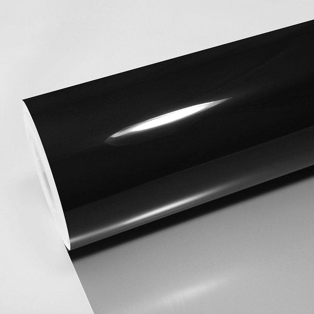 High-gloss TeckWrap BLK Phantom PPF290 black paint protection film roll on white background