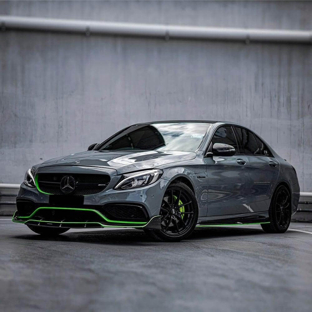 Mercedes-Benz wrapped in TeckWrap Gloss Amazon Grey (CG03-HD) vinyl wrap, accented with vivid green detailing, presenting a bold and sophisticated appearance.