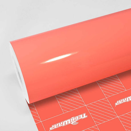 Roll of TeckWrap Gloss Amber Rose vinyl wrap showcasing a vibrant, glossy peach-pink finish, perfect for stylish vehicle transformations (CG36-HD).