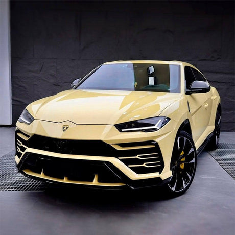 Lamborghini Urus wrapped elegantly in Teckwrap Gloss Amberwave (CG45-HD) Vinyl Wrap, emphasizing a luxurious amber-yellow finish.