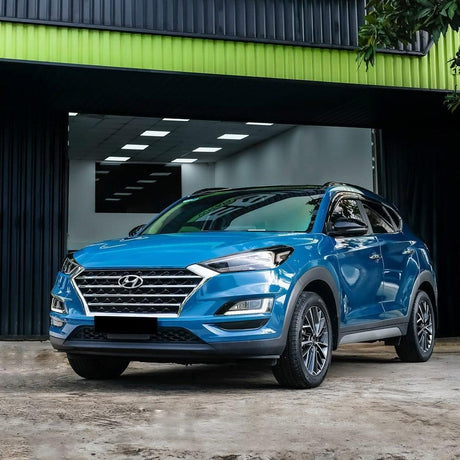 Hyundai SUV stylishly wrapped in TeckWrap Avalon Teal (CG33-HD) gloss vinyl, demonstrating the wrap's rich teal color, flawless glossy finish, and sophisticated enhancement of vehicle aesthetics.