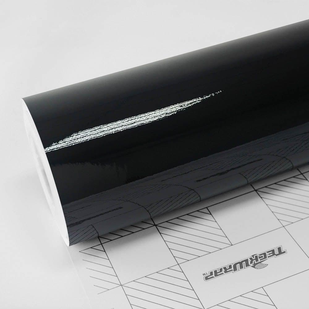 TeckWrap Black Gloss (CG01) vinyl wrap roll showing high-gloss reflective surface and branded backing paper