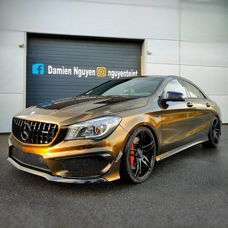 Mercedes-Benz wrapped in TeckWrap Gloss Black Gold (HM09-HD) Vinyl, featuring luxurious metallic gold tones that enhance the car's sporty appearance.