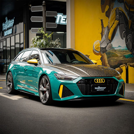 Stylish Audi wrapped in Teckwrap British Racing Green (CG38-HD) Gloss Vinyl, accented with yellow details for a sporty, vibrant look