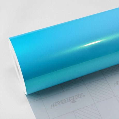 Gloss Caribbean Blue (RB09-HD) Vinyl Wrap roll showcasing its smooth, vibrant turquoise surface with high-gloss finish by Teckwrap.