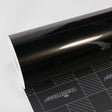 Roll of TeckWrap Gloss Coal Black (MT01-HD) Vinyl Wrap, showcasing its deep, glossy finish and reflective elegance, perfect for sophisticated vehicle customization.