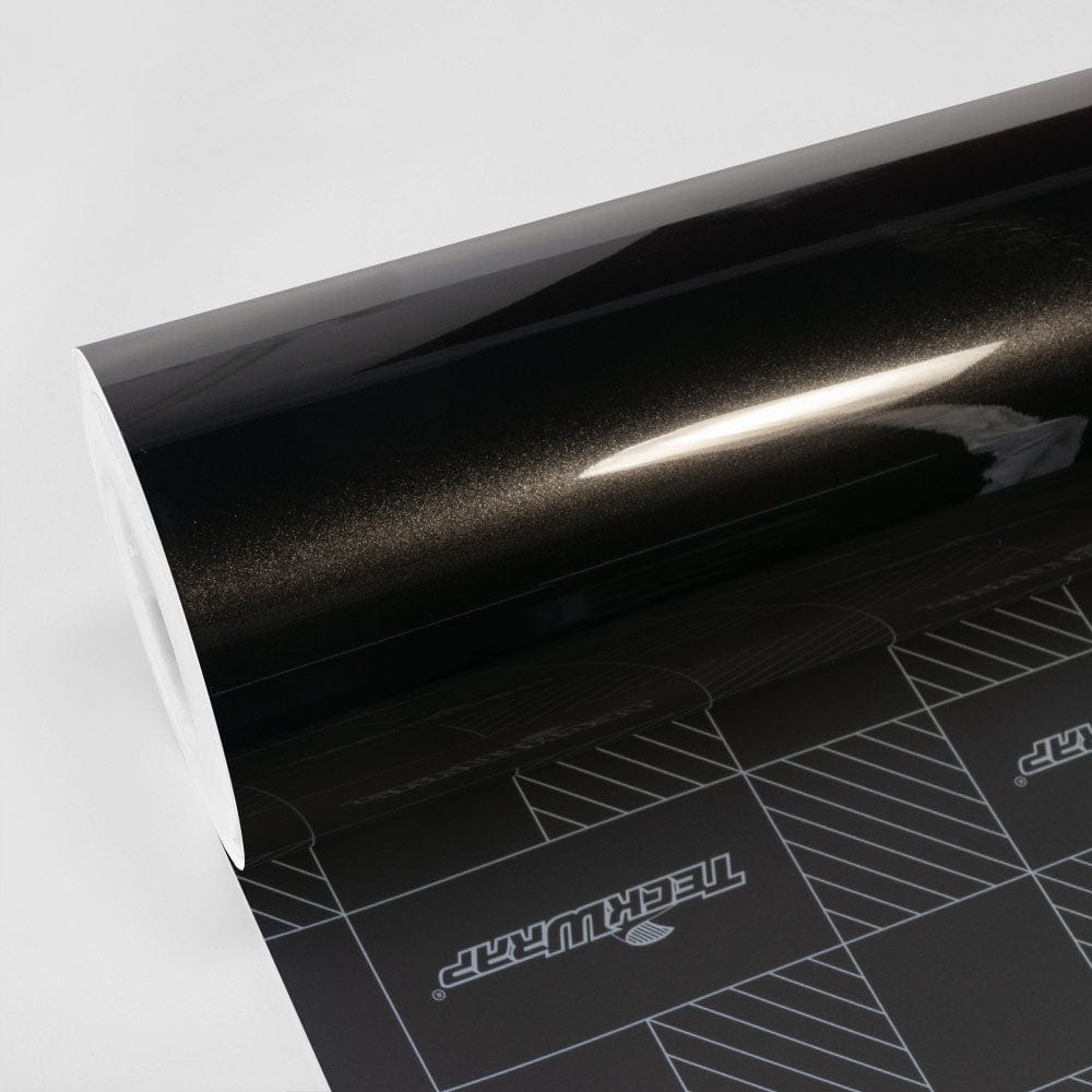 Roll of TeckWrap Gloss Coal Black (MT01-HD) Vinyl Wrap, showcasing its deep, glossy finish and reflective elegance, perfect for sophisticated vehicle customization.