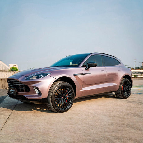 Aston Martin SUV elegantly wrapped in TeckWrap Copper Bronze (HM15-HD) Gloss Vinyl, highlighting its sophisticated metallic glow.