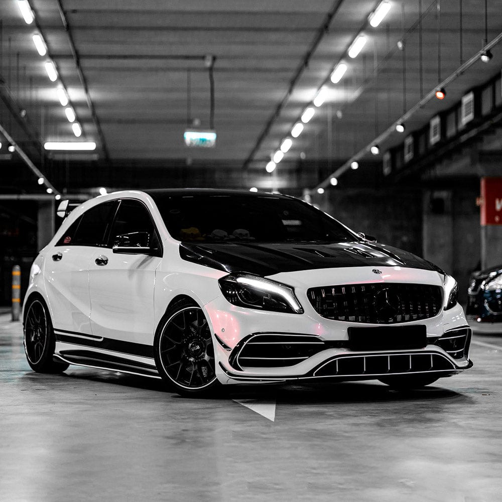 Front-angle view of a luxury car wrapped in Teckwrap Creamrose Pearl (CK523-HD) gloss vinyl wrap, clearly showcasing the wrap's glossy texture and delicate creamrose pearl accents.