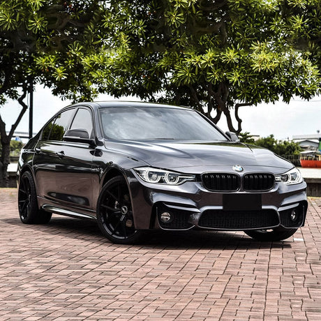 BMW car stylishly wrapped in Dark Platinum (RB12-HD) Gloss Vinyl, highlighting sleek contours and reflective metallic finish by TeckWrap.