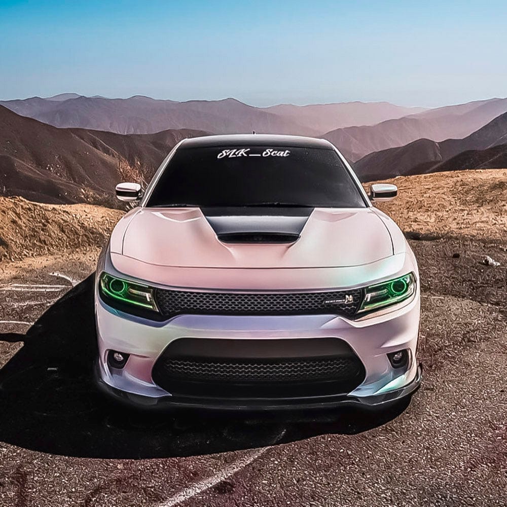 Front-facing close-up of a car featuring Teckwrap Gloss Aurora White (DCH02-HD) vinyl wrap, emphasizing the wrap's captivating, iridescent finish that shifts beautifully under varying light.