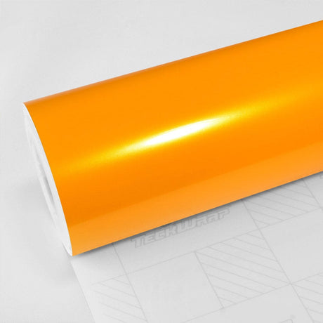 Roll of TeckWrap's Golden Yellow (RB25-HD) glossy vinyl wrap displaying a smooth, bright finish ideal for vehicle customization.