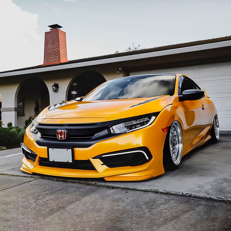 Customized Honda Civic with a sleek, low stance featuring TeckWrap's vibrant Golden Yellow (RB25-HD) gloss vinyl wrap.