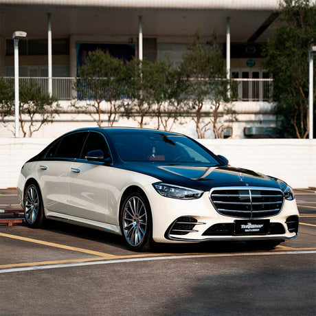 Mercedes-Benz elegantly wrapped in TeckWrap Ivory Cream (CG26-HD) Gloss Vinyl, paired with contrasting black, emphasizing sophistication.